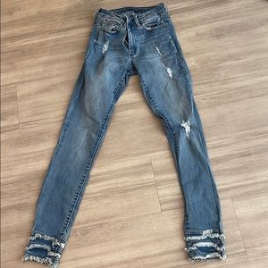 Triple tier ankle tractr jeans
